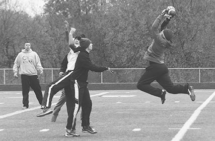 Members of the student touch football league compete on Saturday mornings.