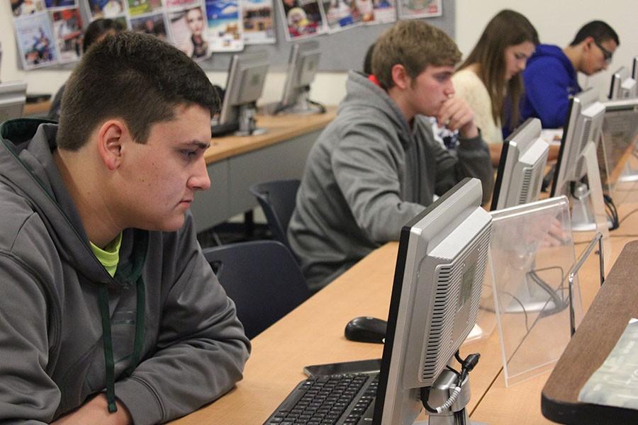 Charles Wabick, senior, works at his computer as part of an eAcademy class.