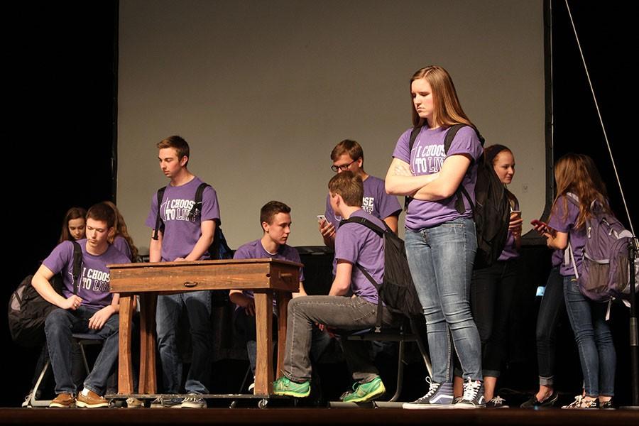 BRAVE members demonstrate the effects that depression has on teens in their skit I Choose to Live. Carley Eschilman, junior, played a depressed teen who thinks about suicide frequently. 