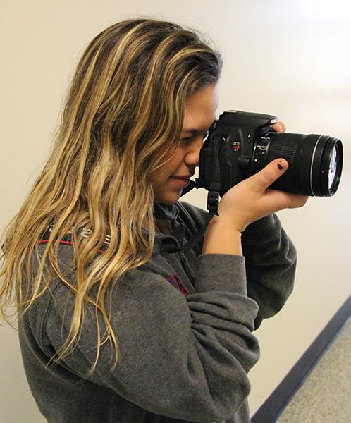 Morgan Hunter, senior, takes pictures as a hobby and a part-time job. 