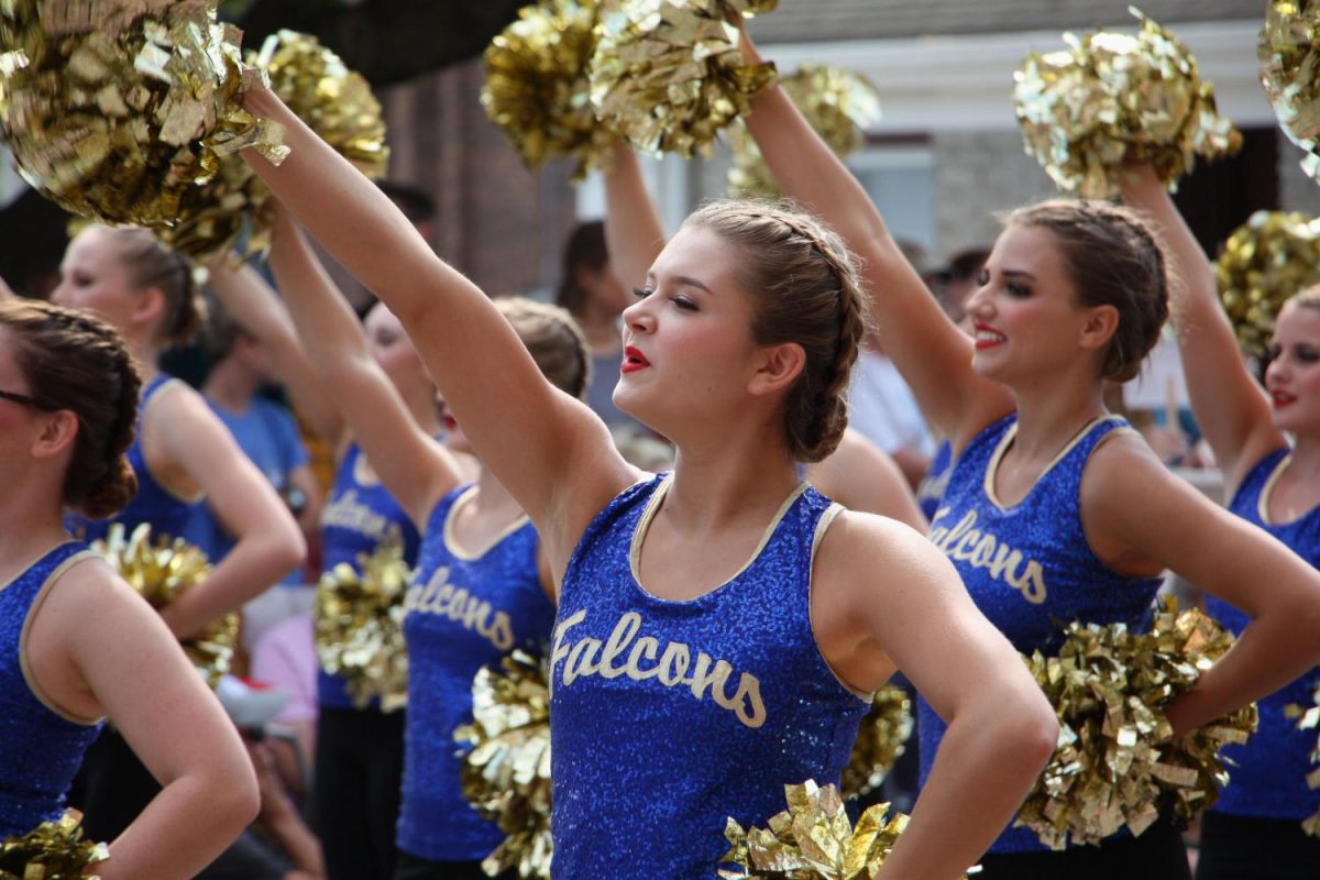 Kennedy+Shaffer+is+front+and+center+with+the+drill+team+during+the+Old+Settlers+Parade.