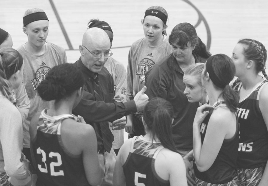Last year, the girls basketball team huddled together while Mike Allen, head coach, explained the next play. Their first game is on Dec. 5 against Olathe East. According to Allen, he is most looking forward to starting over with the team since last year they lost many seniors.  Returning this year includes Lauren Harder, senior, and Caroline Harshbarger, junior. 