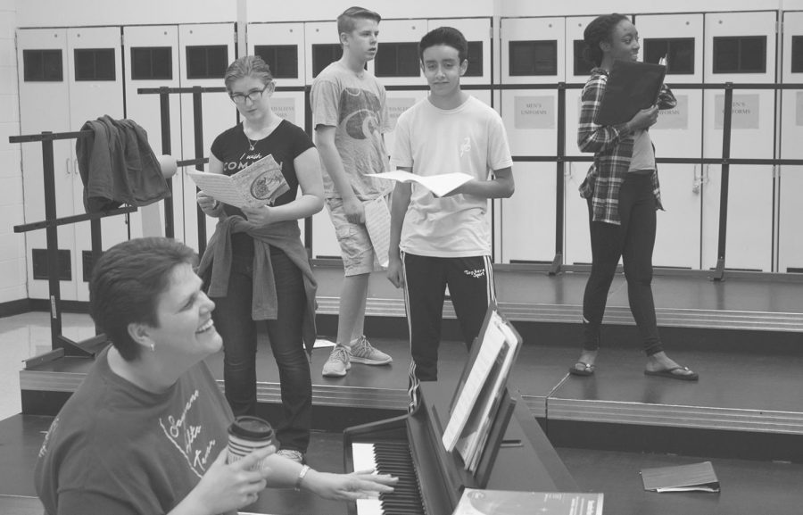Choir rehearses for their holiday performance that will be on Thursday, Dec. 7. Theater and orchestra will be doing a production of “It’s a Wonderful Life” as a radio show that will take place on Dec. 8. Band will also be performing a holiday concert on Dec. 4. All three of the concerts are free. 