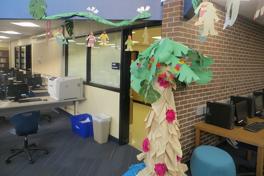 The English Dept. celebrated the season with their winning tree, featuring pages from The Great Gatsby and department members as mermaids and beachcombers. 