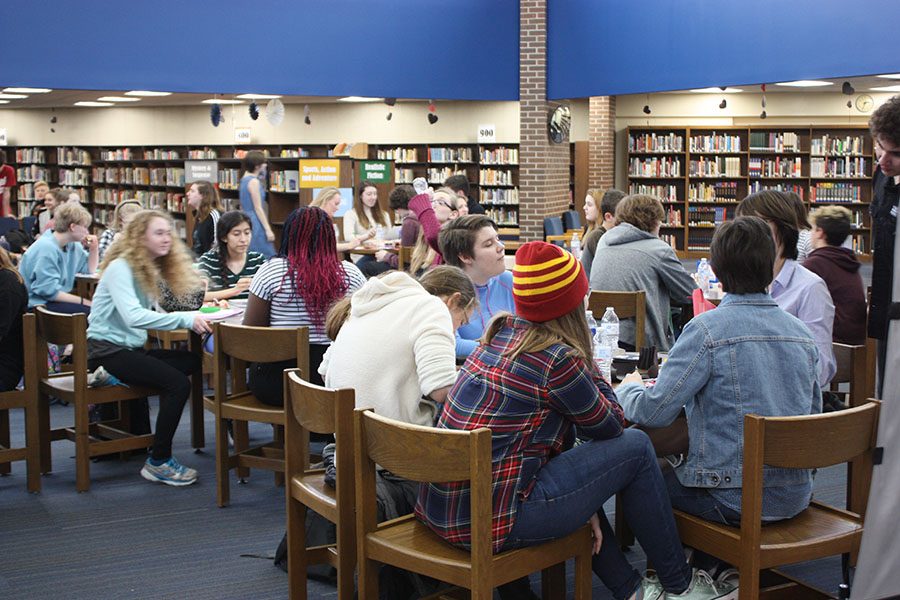 Students socialize at the Anti-Valentines event in the library on Feb. 15.