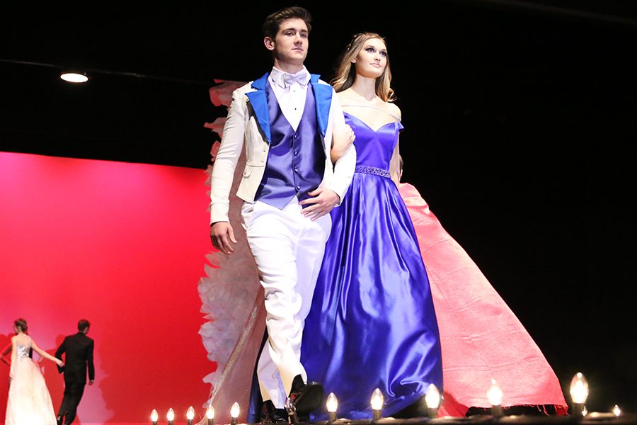M.K. Matje and Nathan Curry, seniors, walking down the runway together styling the royalty wear of the past. March 1st, 2018.