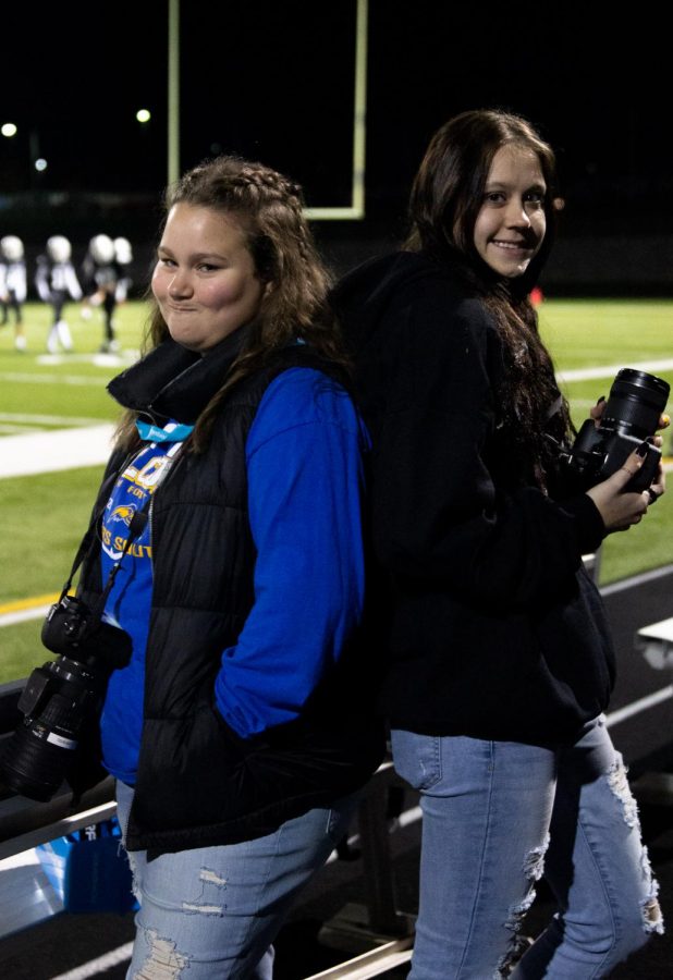 Gracie and Ronnie from our phojo team pose for a picture at the 11/5 Varsity Football game.