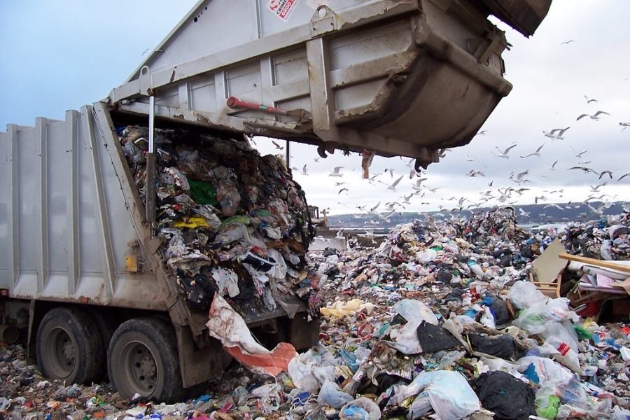Garbage truck pours waste into a dump in Minnesota. The Minnesota Pollution Control Agency defines a dump as a landfill that never held a valid permit from the agency. Some old dumps have leached pollution into nearby soils and bodies of water, threatening groundwater and other natural resources, the MPCAs website said.