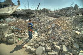 Child standing in the rummage from the attack on Gaza.