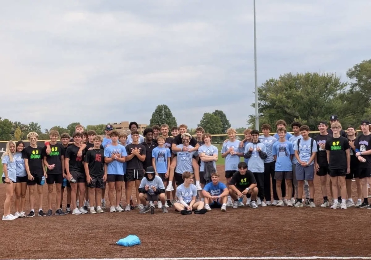 Ryans classmates pose for a photo during the Wiffle Ball Tournment 